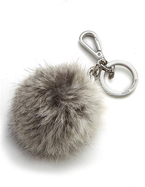 michael kors grey pom pom keychain